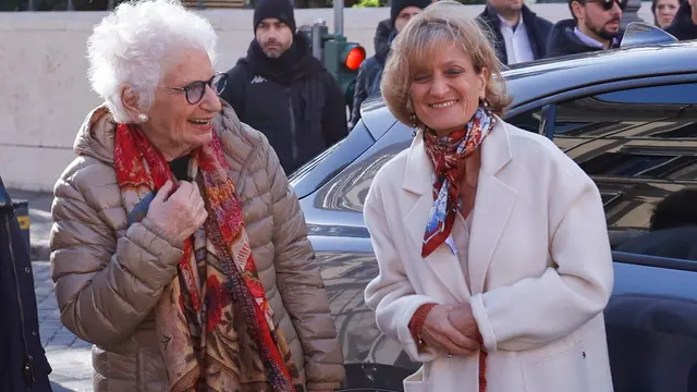 epa11856442 Italian Senator for Life Liliana Segre (L), accompanied by Noemi Di Segni (R), president of the Union of Italian Jewish Communities, arrives for the wreath-laying ceremony at the tombstone of the deportees at the Synagogue of Rome, part of the Holocaust Remembrance Day initiatives, in Rome, Italy, 27 January 2025. EPA/FABIO FRUSTACI