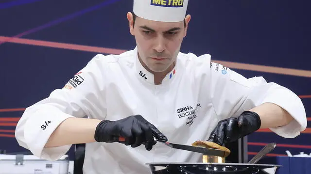 epa11856320 Paul Marcon of France competes in the Bocuse d'Or gastronomy contest at the International Catering, Hotel and Food Trade Fair SIRHA (salon international de la restauration, de l'hotellerie et de l'alimentation) at the Eurexpo hall in Lyon, France, 27 January 2025. EPA/GUILLAUME HORCAJUELO