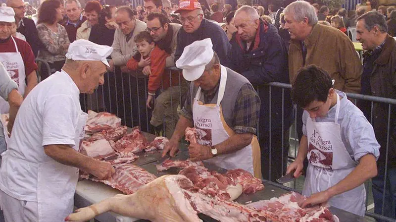 Norcini al lavoro durante una sagra - Foto d'archivio