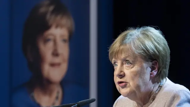 epa11857135 Former German Chancellor Angela Merkel speaks at the presentation of her book 'Freedom: Memoirs 1954 - 2021' at the Volkshaus in Zurich, Switzerland, 27 January 2025. EPA/ENNIO LEANZA