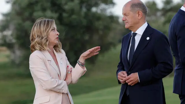 (L-R) Italian Prime Minister Giorgia Meloni and German Chancellor Olaf Scholz attend a Flag ceremony during of the G7 Summit in Borgo Egnazia (Brindisi), southern Italy, 13 June 2024. The G7 Borgo Egnazia Summit will be held from 13 to 15 June 2024. ANSA/GIUSEPPE LAMI