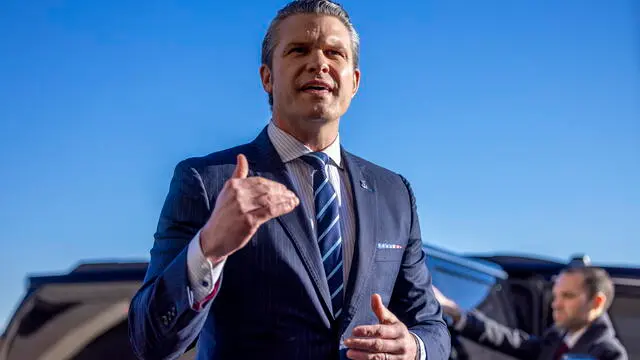 epa11856647 US Secretary of Defense Pete Hegseth responds to a question from the news media after being greeted by US Chairman of the Joint Chiefs of Staff, Charles Q. Brown Jr. (not pictured) as he arrives for his first official day at the Pentagon in Arlington, Virginia, USA, 27 January 2025. The Department of Defense (DoD) will be disbanding all diversity, equity, and inclusion (DEI) programs following the direction of President Donald J Trump's executive order. EPA/SHAWN THEW
