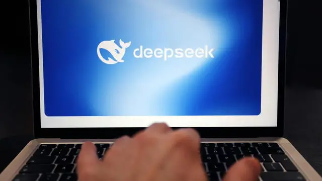 epa11858235 The logo of Chinese startup DeepSeek on a computer screen in London, Britain, 28 January 2025. Shares in major tech firms plummeted following the growing popularity of Deepseek, a Chinese artificial intelligence (AI) app that offers comparable performance at a fraction of the cost of its rivals. This surge in popularity led to a significant drop in investor confidence in the US and Europe, with US tech giant Nvidia losing a sixth of its company value. EPA/ANDY RAIN