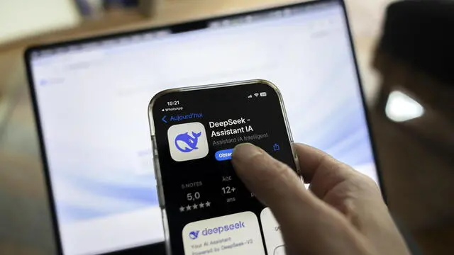 epa11858487 The icon of the Chinese app DeepSeek is seen on a mobile phone, in Geneva, Switzerland, 28 January 2025. Shares in major tech firms plummeted following the growing popularity of Deepseek, a Chinese artificial intelligence (AI) app that offers comparable performance at a fraction of the cost of its rivals. EPA/SALVATORE DI NOLFI