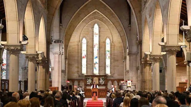 epa11669799 People attend a prayer service during a visit by King Charles III and Queen Camilla to St Thomas' Anglican Church in Sydney, Australia, 20 October 2024. King Charles III and Queen Camilla are visiting Australia from 18 to 23 October. EPA/DEAN LEWINS NO ARCHIVING AUSTRALIA AND NEW ZEALAND OUT