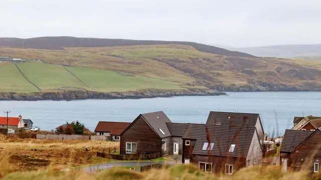 epa11864398 Small villages on the mainland of Shetland Islands, Britain, 30 January 2025. The Shetland Islands are the northern-most tip of Scotland and the group of about 100 islands are situated about 100 miles (160km) off the mainland of Scotland that separate the Atlantic Ocean and the North Sea. The islands' Nordic culture, UNESCO Global Geopark status, and landscapes attract tourists from across the globe. EPA/TOLGA AKMEN