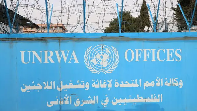 epa11854963 The headquarters of the United Nations Relief and Works Agency for Palestine refugees (UNRWA) in Damascus, Syria, 26 January 2025. Palestinian refugees gathered in a protest demanding the improvement of basic services, especially in the fields of health, education and relief, in addition to providing job opportunities that contribute to improving their living conditions. EPA/MOHAMMED AL RIFAI