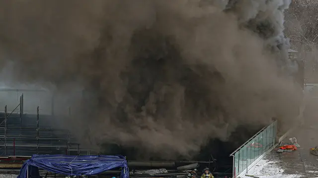 epa11867236 Firefighters work to contain a fire that broke out at the National Hangeul Museum in central Seoul, South Korea, 01 February 2025. EPA/YONHAP SOUTH KOREA OUT