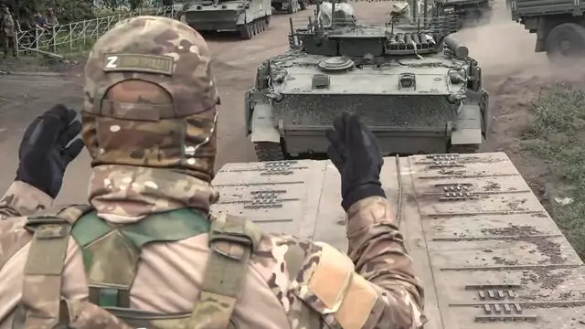 epa11547738 A still image taken from a handout video provided by the Russian Defence Ministry on 13 August 2024 shows Russian military armored vehicles being deployed during the delivery of additional forces and resources in the Kursk region, Russia. Acting Governor of Kursk Region Alexey Smirnov stated that the situation in the region remains difficult with the Ukrainian Armed Forces currently in control of 28 settlements, home to around 2,000 people. According to Smirnov, some 121,000 people have been so far evacuated from the Kursk region. EPA/RUSSIAN DEFENCE MINISTRY PRESS SERVICE/HANDOUT HANDOUT HANDOUT EDITORIAL USE ONLY/NO SALESHANDOUT EDITORIAL USE ONLY/NO SALES