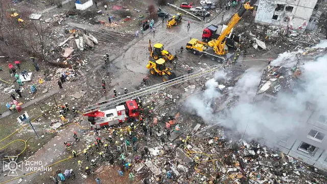 epa11868425 A handout picture made available by the State Emergency Service of Ukraine shows Ukrainian rescuers working at the site of a rocket strike on a residential building in Poltava, Ukraine, 01 February 2025, amid the ongoing Russian invasion. At least seven people died and 17 others, including four children, were injured, the State Emergency Service said. EPA/STATE EMERGENCY SERVICE HANDOUT HANDOUT EDITORIAL USE ONLY/NO SALES