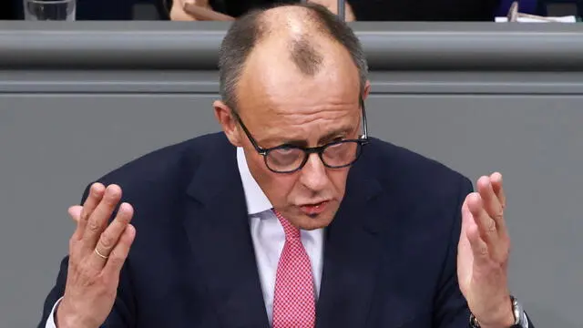 epa11866047 Chairman of the Christian Democratic Union (CDU) party and faction Friedrich Merz speaks during a session of the German parliament 'Bundestag' in Berlin, Germany, 31 January 2025. The Christian Democratic Union (CDU) is expected to put a draft law to limit the illegal influx of third-country nationals to Germany up for vote. The law might be adopted with votes of the Alternative for Germany party (AfD), which would represent a crack of the CDU's previous stance of maintaining a so-called 'firewall' against collaboration with the far-right party. EPA/CLEMENS BILAN