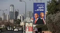 I volti di Benjamin Netanyahu e Donald Trump a Tel Aviv - Foto Ansa © www.giornaledibrescia.it