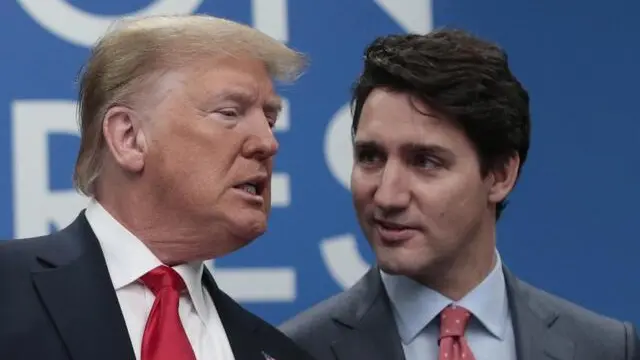 epa08044297 US President Donald Trump (L) and Canada's Prime minister Justin Trudeau (R) during NATO Summit in London, Britain, 04 December 2019. NATO countries' heads of states and governments gather in London for a two-day meeting. EPA/OLIVIER HOSLET