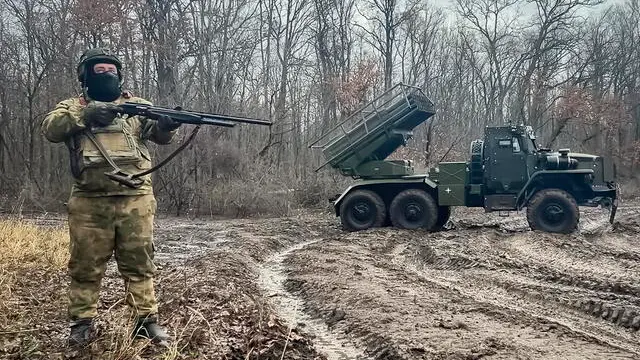 epa11828956 A still image taken from a handout video made available by the Russian Defence Ministry Press-Service on 16 January 2025 shows Russian serviceman as the BM-21 'Grad' jet rocket systems prepares for launch in border areas of the Kursk region, Russia. Fighting between Russian and Ukrainian forces has been ongoing in the Kursk region since 06 August 2024 following a Ukrainian military incursion into the Russian border region. EPA/RUSSIAN DEFENCE MINISTRY HANDOUT HANDOUT EDITORIAL USE ONLY/NO SALES