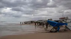 epa11739346 A general view of internally displaced Palestinian tents after sea water swept them away in the Al-Mawasi area, on the beach near Khan Yunis, southern Gaza Strip, 25 November 2024. According to the UN, at least 1.9 million people (or nine in ten people) across the Gaza Strip are internally displaced, including people who have been repeatedly displaced. Since October 2023, only about 11 percent of the Gaza Strip has not been placed under Israeli-issued evacuation orders, the UN aid coordination office OCHA said. EPA/HAITHAM IMAD