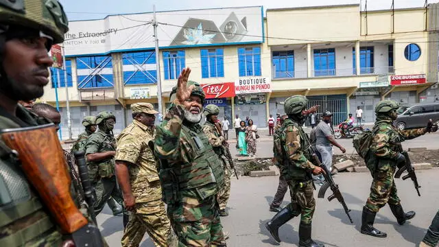 epa11868052 Leader of Alliance Fleuve Congo (AFC) Corneille Nangaa (C) waves as he arrives to participate in a cleanup exercise of the city of Goma, Democratic Republic of the Congo, 01 February 2025. The M23 (March 23 Movement) rebel group called for all residents to participate in a cleaning exercise of Goma city, the capital of the North Kivu Province, days after claiming to have captured most of it after launching a large-scale offensive in the east of the DR Congo, which the DR Congo and the UN accuse Rwanda of backing. EPA/DANIEL IRUNGU