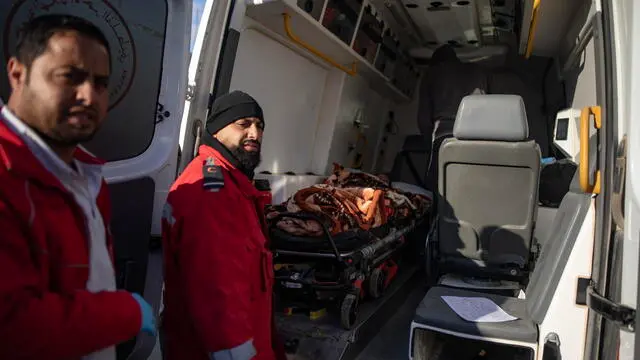 epa11867330 Palestinian ambulances transport wounded and sick people to the Rafah crossing to leave the Gaza Strip for treatment abroad, amid a ceasefire between Hamas and Israel, in Khan Yunis, southern Gaza Strip, 01 February 2025. Gazaâ€™s Health Ministry confirmed that a number of Palestinians would enter Egypt February 01 via the Rafah crossing, which has been shut to human traffic since May 2024. EPA/HAITHAM IMAD