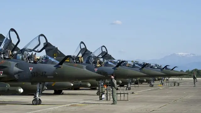 epa02647088 A handout photo issued by the Ministry of Defense, showing Mirage 2000 fighter jet before a mission over Libya, at the Solenzara military air base in Solenzara, France, 21 March 2011. The Mirage 2000 have been used by the French Air Force to enforce the Libyan no-fly zone in according to UN Security Council resolution. EPA/ANTHONY JEULAND / ECPAD HANDOUT EDITORIAL USE ONLY/NO SALES