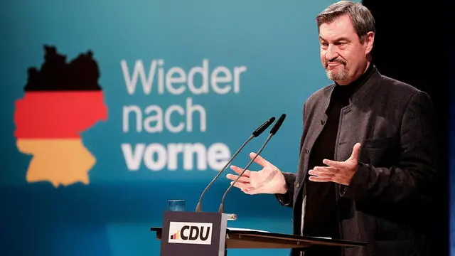 epa11835891 State Premier of Bavaria and Christian Social Union (CSU) chairman Markus Soeder delivers a speech during a Bavarian veal sausage breakfast in Brilon, Germany, 19 January 2025. EPA/FRIEDEMANN VOGEL