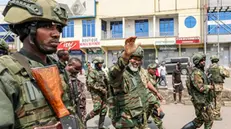 epa11868072 Leader of Alliance Fleuve Congo (AFC) Corneille Nangaa (C) waves as he arrives to participate in a cleanup exercise of the city of Goma, Democratic Republic of the Congo, 01 February 2025. The M23 (March 23 Movement) rebel group called for all residents to participate in a cleaning exercise of Goma city, the capital of the North Kivu Province, days after claiming to have captured most of it after launching a large-scale offensive in the east of the DR Congo, which the DR Congo and the UN accuse Rwanda of backing. EPA/DANIEL IRUNGU