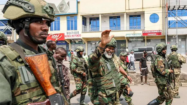 epa11868072 Leader of Alliance Fleuve Congo (AFC) Corneille Nangaa (C) waves as he arrives to participate in a cleanup exercise of the city of Goma, Democratic Republic of the Congo, 01 February 2025. The M23 (March 23 Movement) rebel group called for all residents to participate in a cleaning exercise of Goma city, the capital of the North Kivu Province, days after claiming to have captured most of it after launching a large-scale offensive in the east of the DR Congo, which the DR Congo and the UN accuse Rwanda of backing. EPA/DANIEL IRUNGU