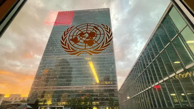 epa09479283 The United Nations headquarters building is seen from inside the General Assembly hall before heads of state begin to address the 76th Session of the U.N. General Assembly in New York City, USA, 21 September 2021. EPA/EDUARDO MUNOZ / POOL