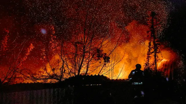 epa11869620 Emergency services at the site of a drone strike on a civil factory in Kharkiv, Ukraine, 02 February 2025 amid the ongoing Russian invasion. Nobody was injured in the attack, according to the State Emergency Service report. EPA/SERGEY KOZLOV