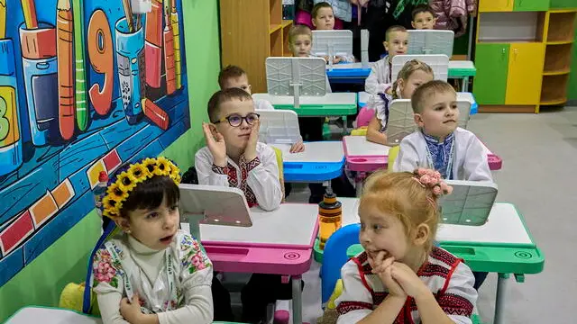 epa11856694 Ukrainian students attend a new underground school in Kharkiv, Ukraine, 27 January 2025, amid the ongoing Russian invasion. Currently, 750 children are enrolled in the school following the completion of the first construction phase. Once the entire complex is finished, more than 1,000 children will be able to attend. Kharkiv plans to build at least six more underground schools until the new academic year due to the significant risk of Russian attacks and Kharkiv's proximity to the frontline, according to Mayor Ihor Terekhov. EPA/SERGEY KOZLOV