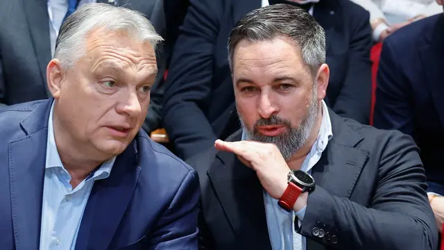 epa11882227 Leader of Spain's far-right party VOX Santiago Abascal (R) chats with Hungarian Prime Minister Viktor Orban during the first summit of EU far-right parties in Madrid, Spain, 08 February 2025. The summit is held under the slogan 'Make Europe Great Again'. EPA/SERGIO PEREZ