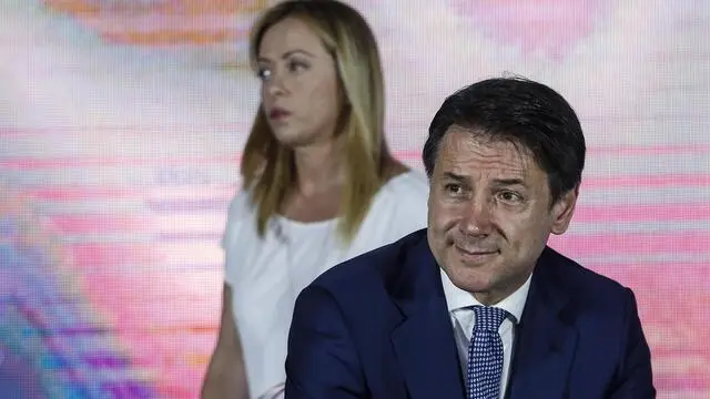 Il presidente del Consiglio Giuseppe Conte e Giorgia Meloni ad ''Atreju 2019'', Roma 21 settembre 2019. ANSA/FABIO FRUSTACI