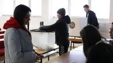 epa11883975 A man casts his ballot during the parliamentary elections in Pristina, Kosovo, 09 February 2025. About two million voters are eligible to vote for the 120 seats in Kosovo's parliament, 20 of which are reserved for ethnic Serbs and other minorities. EPA/GEORGI LICOVSKI