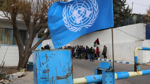 epa11854984 Palestinian refugees in Syria protest outside the headquarters of the United Nations Relief and Works Agency for Palestine refugees (UNRWA) in Damascus, Syria, 26 January 2025. Palestinian refugees gathered in a protest demanding the improvement of basic services, especially in the fields of health, education and relief, in addition to providing job opportunities that contribute to improving their living conditions. EPA/MOHAMMED AL RIFAI