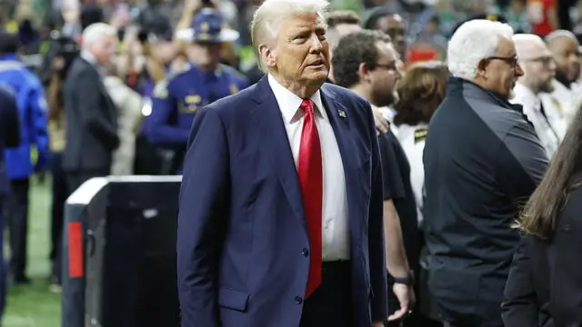 epa11885234 US President Donald Trump on the field before Super Bowl LIX between the Kansas City Chiefs and the Philadelphia Eagles at Caesars Superdome in New Orleans, Louisiana, USA, 09 February 2025. The Super Bowl is the annual championship game of the NFL between the AFC Champion and the NFC Champion and has been held every year since 1967. EPA/ERIK S. LESSER