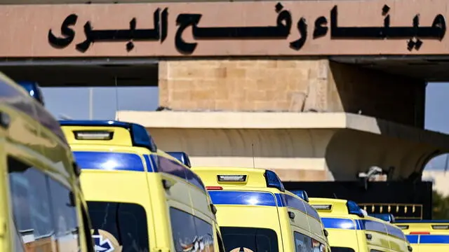 epa11888001 Ambulances drive on the Egyptian side of the Rafah border crossing between Egypt and the Gaza Strip, in Rafah, Egypt, 11 February 2025. The first phase of a six-week ceasefire deal between Israel and Hamas came into effect on 19 January 2025. Under the ceasefire deal, a number of patients and wounded people are allowed to be evacuated from the Gaza Strip. EPA/MOHAMED HOSSAM