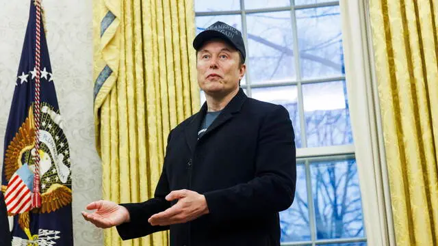 epa11889336 US entrepreneur and U.S. special government employee Elon Musk gives remarks to the media in the Oval Office of the White House, as he meets with US President Donald J. Trump in the Oval Office of the White House, as he meets with Elon Musk (L), in Washington, DC, USA, 11 February 2025. EPA/Aaron Schwartz / POOL