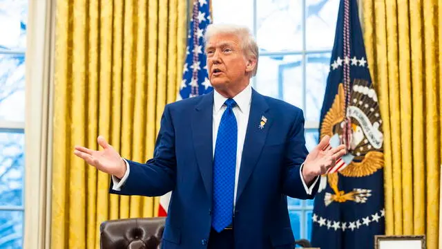 epa11891826 US President Donald Trump speaks to the media in the Oval Office of the White House in Washington, DC, USA, 12 February 2025. Trump spoke after the swearing in of his nominee for Director of National Intelligence Tulsi Gabbard. EPA/JIM LO SCALZO / POOL