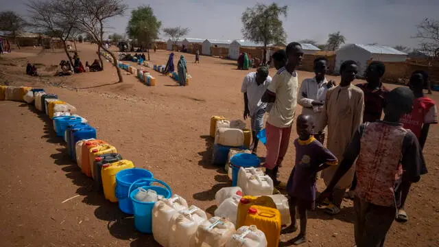 epa11267332 Sudanese refugees wait for their turns to fetch water from wells made available by the NGO Doctors Without Borders (MSF) at the Farchana refugee camp near the East Chad Sudan border, 07 April 2024.(Issued 09 April 2024). Some 47.000 people live in the Farchana camp, each individual in this camp has access to less than 8 liters per person. Lack or poor access to water is one of the many consequences of the humanitarian crises provoked the war in neighbouring Sudan which started on 15 April 2023. According to the UNHCR in March 2024, in one year more than 500,00 Sudanese refugees, mainly from Darfur region, have crossed into Chad looking for safety, 90 percent of them are women and children. As different humanitarian crises are unfolding in other parts of the world, both the UN and NGOs like MSF keep appealing for more aid to reach Sudan and avoid a looming famine situation in the already strained socio-economic context of Chad. EPA/STRINGER