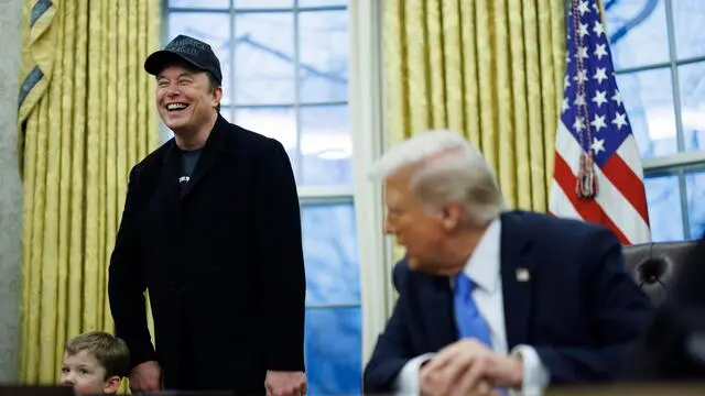 epa11889324 US President Donald J. Trump (R) gives remarks to the media in the Oval Office of the White House, as he meets with US entrepreneur and U.S. special government employee Elon Musk (L), in Washington, DC, USA, 11 February 2025. EPA/Aaron Schwartz / POOL