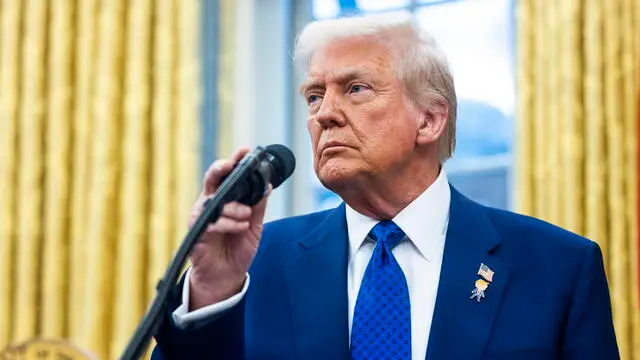 epa11891809 US President Donald Trump speaks to the media in the Oval Office of the White House in Washington, DC, USA, 12 February 2025. Trump spoke after the swearing in of his nominee for Director of National Intelligence Tulsi Gabbard. EPA/JIM LO SCALZO / POOL