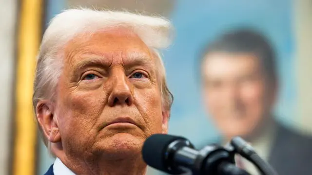 epa11891824 US President Donald Trump speaks to the media in the Oval Office of the White House in Washington, DC, USA, 12 February 2025. Trump spoke after the swearing in of his nominee for Director of National Intelligence Tulsi Gabbard. EPA/JIM LO SCALZO / POOL
