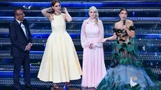 (L-R) Sanremo Festival host and artistic director Carlo Conti, Italian actor Miriam Leone, Italian actor Katia Follesa and Italian singer Elettra Lamborghini on stage at the Ariston theatre during the 75th edition of the Sanremo Italian Song Festival, in Sanremo, Italy, 13 February 2025. The music festival will run from 11 to 15 February 2025. ANSA/ETTORE FERRARI