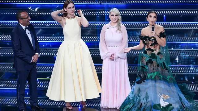 (L-R) Sanremo Festival host and artistic director Carlo Conti, Italian actor Miriam Leone, Italian actor Katia Follesa and Italian singer Elettra Lamborghini on stage at the Ariston theatre during the 75th edition of the Sanremo Italian Song Festival, in Sanremo, Italy, 13 February 2025. The music festival will run from 11 to 15 February 2025. ANSA/ETTORE FERRARI