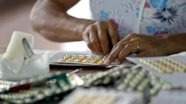 epa03613614 A worker packs medicine which is provided by the United States Agency for International Development (USAID), at the central ware house where USAID funded commodities are packed and distrubuted, in Yangon, Myanmar, 07 March 2013. The Administrator of USAID, Dr. Rajiv Shah, and a delegation are currently in Myanmar for an official visit and will met a range of development partners and USAID-supported projects. Shah's visit follows the US-Burma Partnership for Democracy, Peace and Prosperity that US President Barack Obama launched during his historic visit to the country in November 2012. USAID-supported projects and will make important announcements about future USAID programs. Dr. Shah's visit build up on the U.S- Burma Partnership for Democracy, Peace and Prosperity that U.S. President Barack Obama launched during his historic visit to the country in November 2012. EPA/NYEIN CHAN NAING