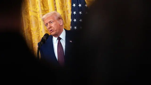 epa11894715 US President Donald Trump attends a press conference with Indian Prime Minister Narendra Modi (not pictured) at the White House, Washington, DC, USA, 13 February 2025. EPA/WILL OLIVER