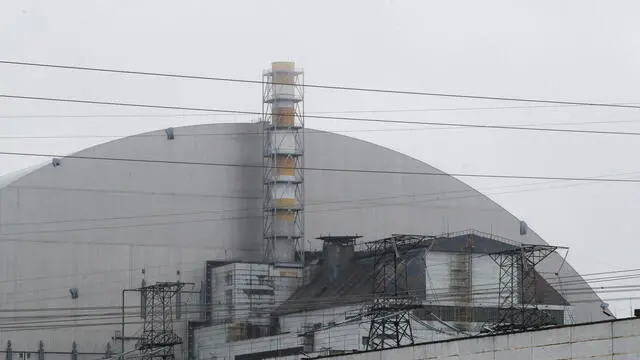 epa09910565 The protective shelter over the remains of the nuclear reactor Unit 4 at the Chernobyl nuclear power plant near the city of Chernobyl, Ukraine, 26 April 2022. Ukraine marks the 36th anniversary of the Chernobyl tragedy on 26 April 2022. The explosion of reactor 4 of the Chernobyl nuclear power plant in the early hours of 26 April 1986 is still regarded as the worst nuclear disaster to date. EPA/SERGEY DOLZHENKO