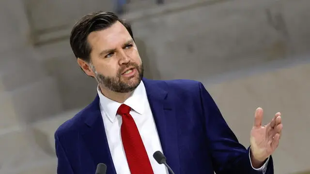 epa11888236 US Vice President JD Vance delivers a speech during a plenary session of the Artificial Intelligence (AI) Action Summit at the Grand Palais in Paris, France, 11 February 2025. The summit takes place from 10 to 11 February. EPA/MOHAMMED BADRA