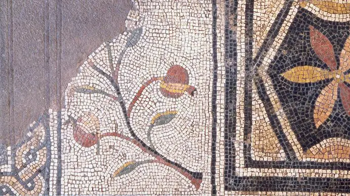 Mosaico raffigurante un piccolo ramo con attaccato un frutto