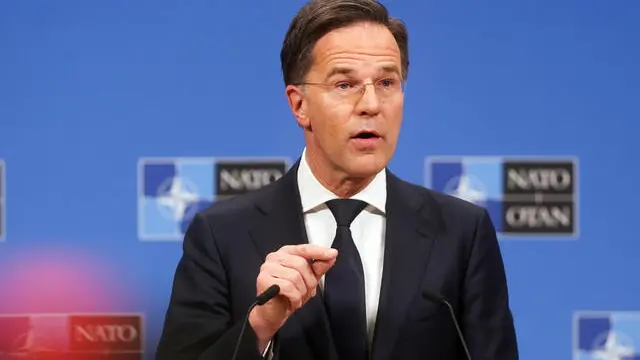 epa11890363 NATO Secretary-General Mark Rutte gives a press conference ahead to a North Atlantic Treaty Organization (NATO) Defense Ministers' meeting at the alliance's headquarters in Brussels, Belgium, 12 February 2025. EPA/OLIVIER HOSLET