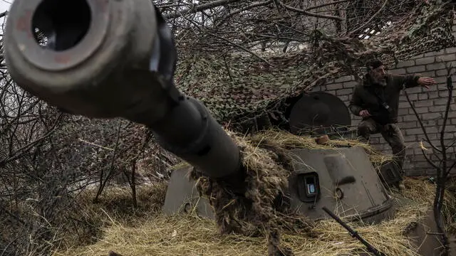 epa11884196 A handout picture made available 09 February 2025 by the press service of the 24th Mechanized Brigade of Ukrainian Armed Forces, shows servicemen of the 24th Mechanized Brigade named after King Danylo, preparing to fire 2S1 self-propelled 122mm howitzer towards Russian positions, near Chasiv Yar in the Donetsk region, Ukraine, 07 February 2025 amid the Russian invasion. Russian troops entered Ukrainian territory on 24 February 2022, starting a conflict that has provoked destruction and a humanitarian crisis. EPA/Press service of the 24 Mechanized brigade HANDOUT HANDOUT EDITORIAL USE ONLY/NO SALES