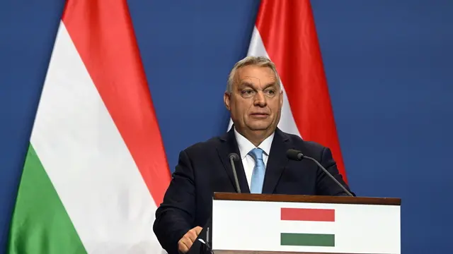 epa11890379 Hungarian Prime Minister and leader of the ruling Fidesz party Viktor Orban attends a press conference following a meeting with Co-chairwoman and chancellor candidate of the Alternative for Germany (AfD) party Alice Weidel in the government headquarters in Budapest, Hungary, 12 February 2025. EPA/SZILARD KOSZTICSAK HUNGARY OUT